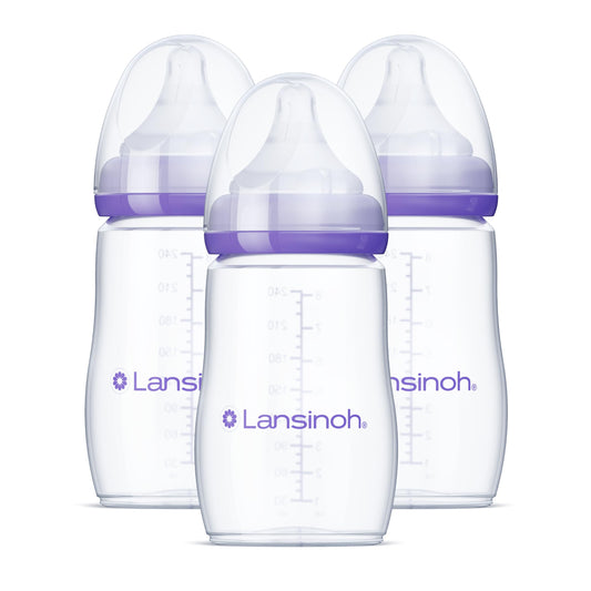 Three clear Lansinoh eight-ounce baby bottles with medium-flow nipples and caps